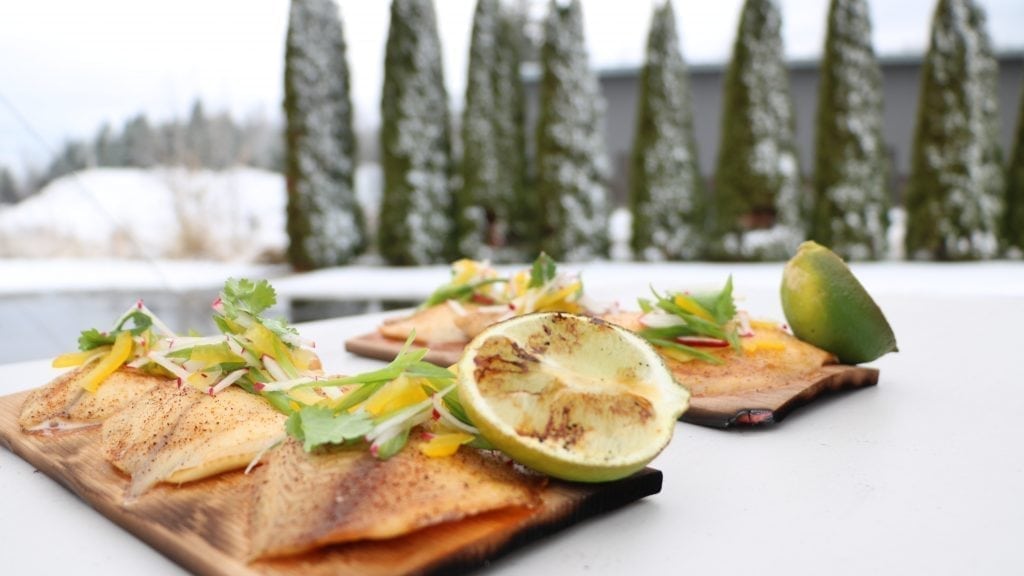 Alder Planked Tilapia with Radish Slaw and grilled Lime Wildwood Grilling