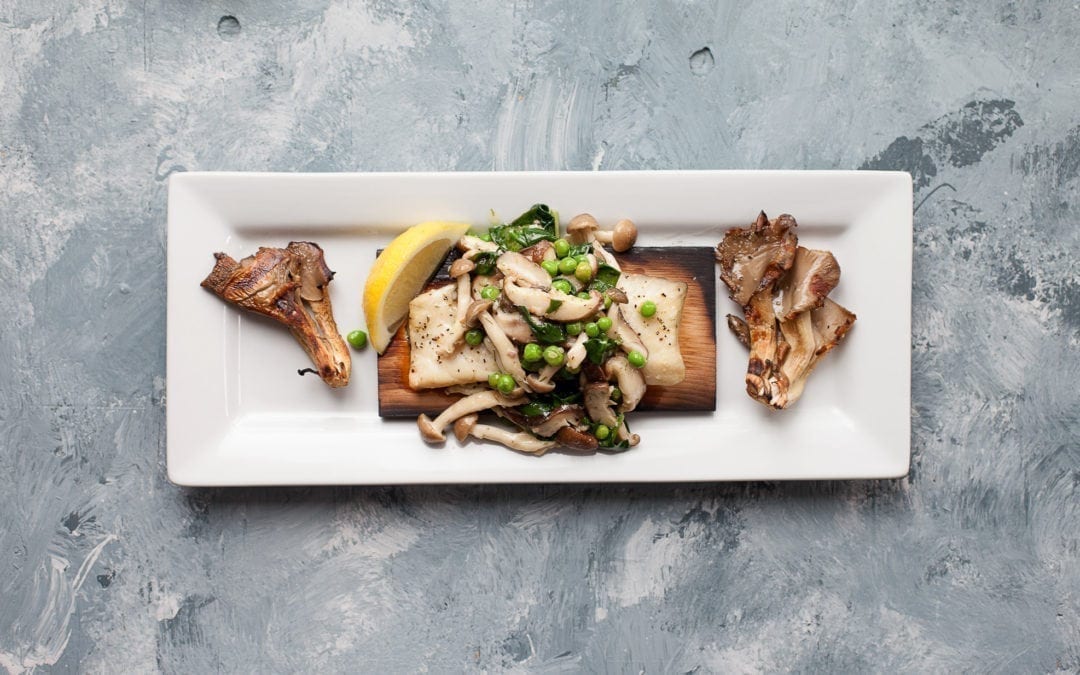 Alder Planked Halibut with HerbButtered Mushrooms, Spinach and Spring