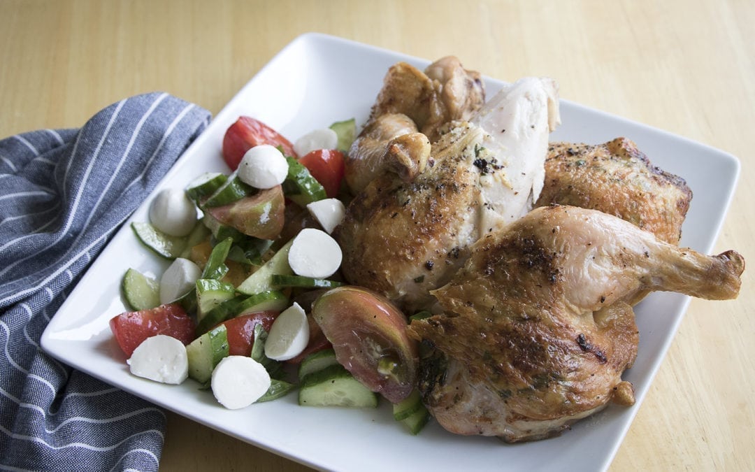 Cedar Planked Herb Buttered Spatchcocked Chicken with Tomato Salad